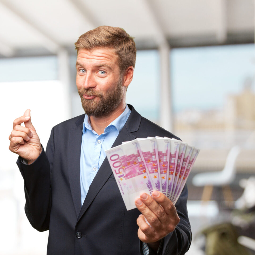 blond businessman happy expression